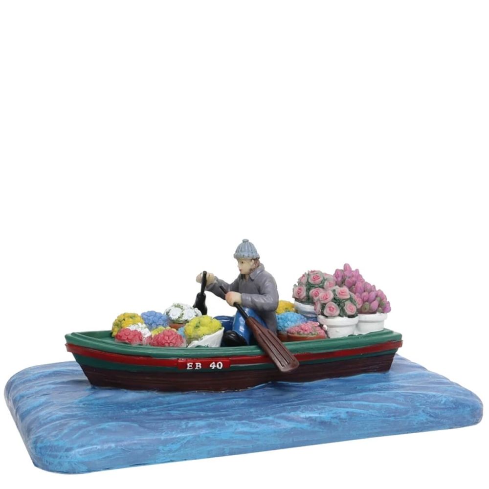 Santaville - Man in Boat with Flowers