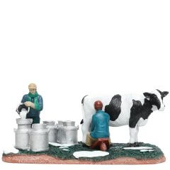 Santaville - Milkfarmer with Cow and Pours Milk